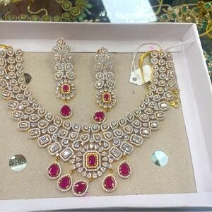 Silver and gold mix original ad necless and earing